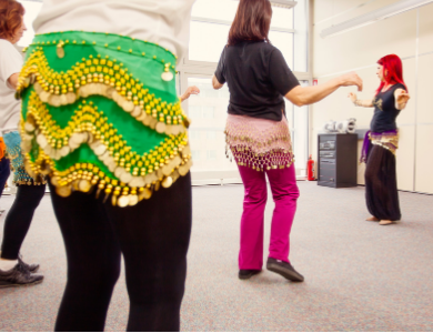 woman taking belly dancing class