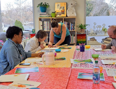 people working on an art project